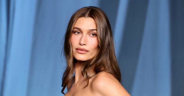 Hailey Bieber mostra a luta para sentar em um vestido glamoroso com espartilho na gala do Museu da Academia de 2025