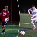 O goleiro do Herricks, Brayden Haase, segurando uma bola de futebol em um campo.