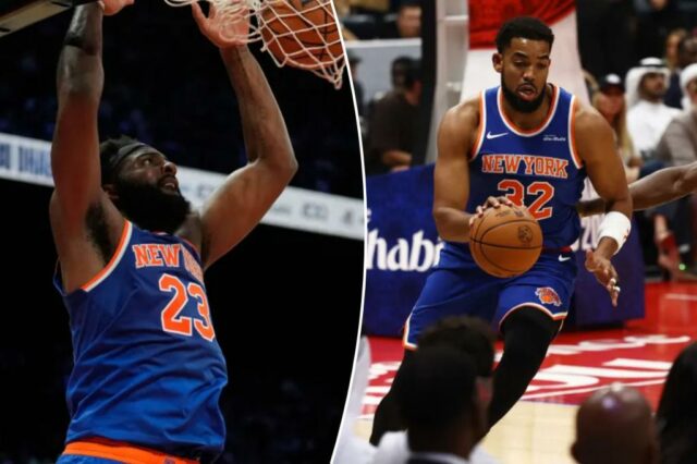 Karl-Anthony Towns em ação com Adem Bona durante o jogo da NBA entre o New York Knicks e o Philadelphia 76ers.