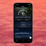 O mais recente aplicativo de anel inteligente Oura tem lições para o aplicativo de saúde da Apple | Captura de tela no fundo rosa das nuvens do pôr do sol