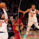 O guarda do New York Knicks, Jalen Brunson (11), dá um chute contra o guarda do Cleveland Cavaliers, Donovan Mitchell (45), durante o quarto período no Madison Square Garden.