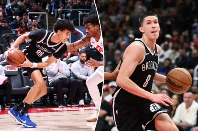 Nolan Traore #88 do Brooklyn Nets tenta passar a bola durante o jogo contra o Toronto Raptors em 17 de outubro de 2025 na Scotiabank Arena em Toronto, Ontário, Canadá. 