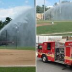 Os bombeiros de Maryland acusaram após inundar o campo de beisebol com mangueira de caminhão durante a briga de longa duração