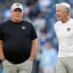 Offensive coordinator Chip Kelly and head coach Pete Carroll of the Las Vegas Raiders