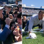 O secretário de Guerra Pete Hegseth e o tenente-general do Corpo de Fuzileiros Navais Michael J. Borgschulte participando de uma tentativa de recorde mundial de flexão no jogo de futebol da Marinha vs. Aérea.
