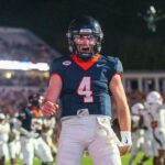 O jogador nº 17 do Penn State Nittany Lions, Ethan Grunkemeyer, mergulha para um touchdown contra o Nevada Wolf Pack.