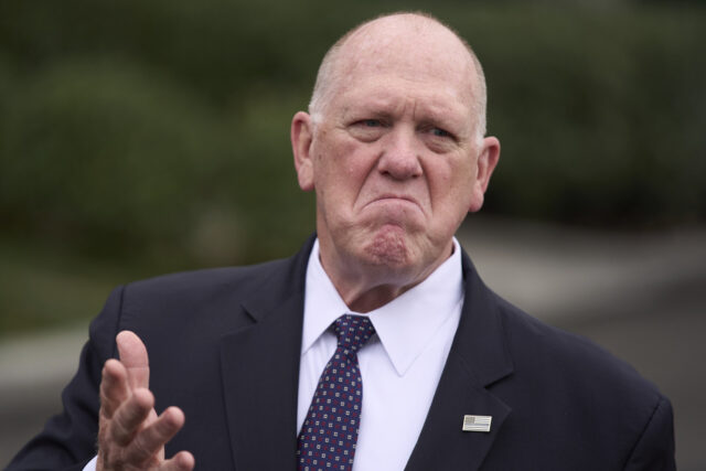 President Donald Trump listens as White House border czar Tom Homan speaks at an event to promote his domestic policy and budget agenda in the East Room of the White House, Thursday, June 26, 2025, in Washington. (AP Photo/Jose Luis Magana)
