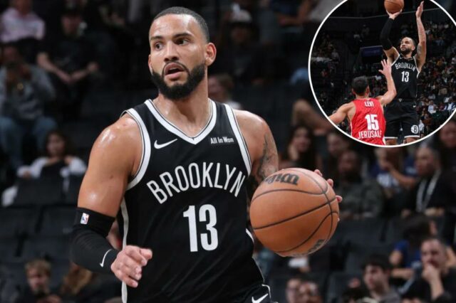 Tyrese Martin, que marcou três pontos, parece fazer uma jogada durante a vitória do Nets 123-88 sobre Hapoel Jerusalém em 4 de outubro de 2025.