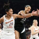 A'ja Wilson #22 do Las Vegas Aces atira a bola contra Alyssa Thomas #25 do Phoenix Mercury.