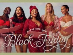 A promoção da Victoria’s Secret Black Friday tem até 35% de desconto para levantar bebidas e xícaras Uma mulher usando um sutiã vermelho com alças enfeitadas.