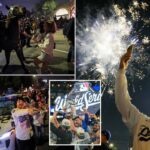 A vitória dos Dodgers World Series provoca caos nas ruas de Los Angeles – a polícia usa gás lacrimogêneo após ser atingida por fogos de artifício e garrafas