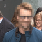 111225_glen_powell_guess_who_blur