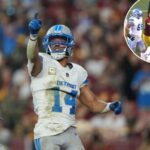 Amon-Ra St. Brown do Detroit Lions comemora um touchdown.