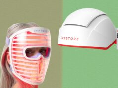 As ofertas da Black Friday da iRestore estão prestes a aumentar minha rotina anti-envelhecimento Um sistema de crescimento de cabelo iRestore, incluindo um capacete branco com detalhes vermelhos e um controle remoto branco.