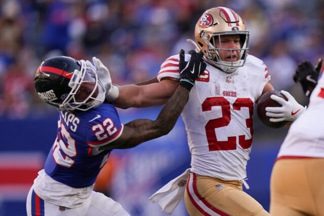 Brian Robinson Jr., nº 3 do San Francisco 49ers, marca um touchdown contra o New York Giants durante o quarto período do jogo no MetLife Stadium em 02 de novembro de 2025 em East Rutherford, Nova Jersey. (Foto de Sarah Stier/Getty Images)