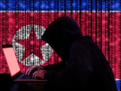Coreia do Sul suspeita que Coreia do Norte esteja por trás de hack de exchange de criptomoedas e roubo de US$ 30,4 milhões Ilustração de uma figura encapuzada digitando em um laptop com uma bandeira digital da Coreia do Norte ao fundo.