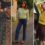 Mulher com um cardigã amarelo mostarda e blusa com decote em V em um carro.