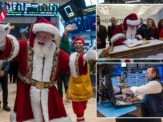 Dow salta mais de 300 pontos – a caminho do quarto dia consecutivo de ganhos com a visita do Papai Noel à NYSE Papai Noel e um elfo tocando sinos na Bolsa de Valores de Nova York.