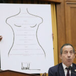 Desenho animado de Mike Luckovich