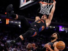 Josh Hart faz seu retorno no quarto período valer a pena em desempenho histórico dos Knicks O armador do New York Knicks, Josh Hart, enterra a bola contra o Miami Heat no segundo tempo no Madison Square Garden em Nova York, Nova York, 14 de novembro de 2025.