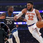 O pivô do New York Knicks, Karl-Anthony Towns, vai para a cesta enquanto Julius Randle defende os Timberwolves.