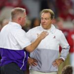 Former college football head coach Nick Saban of the Alabama Crimson Tide and head coach Brian Kelly of the LSU Tigers