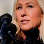 Desenho animado de Mike Luckovich