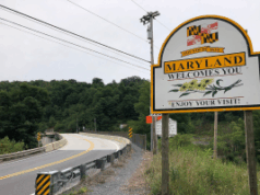 Maryland se torna o último estado a alertar os licenciados sobre mercados de previsão Lado de uma estrada que faz uma curva para a esquerda, com uma placa no lado direito que diz 'Maryland lhe dá as boas-vindas, aproveite sua visita!' Maryland se torna o último estado a alertar os licenciados sobre mercados de previsão