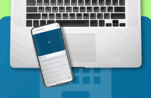 Meu laptop quebrou, o dia do pagamento estava longe e um aplicativo Android salvou o dia silenciosamente Vista aproximada da mão controlando o aplicativo de mouse remoto na frente do laptop MacBook