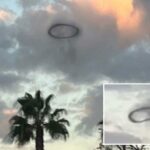 Um anel preto nas nuvens sobre a Disneylândia.