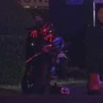 Serviços de emergência em torno de um acidente de motocicleta na zona sul da Gold Coast.