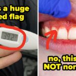 Termômetro digital exibindo uma temperatura de 39,2°C sendo segurado na mão