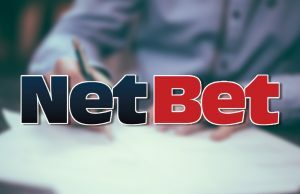 NetBet multado em US$ 850 mil após falhas em AML e responsabilidade social Logotipo da NetBet Enterprises em um fundo de documento legal. NetBet multado em US$ 850 mil após falhas em AML e responsabilidade social