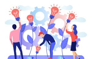 O cofundador da Databricks argumenta que os EUA devem adotar o código aberto para vencer a China em IA Image of a group of people collecting the fruits of plants in the form of a light bulb idea with gears in the background.