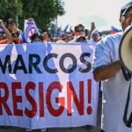 Membros do grupo religioso Iglesia ni Cristo (Igreja de Cristo) participam do primeiro de um protesto anticorrupção de três dias na arquibancada Quirino, Manila, Filipinas, em 16 de novembro de 2025. REUTERS/Noel Celis