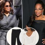 Uma mulher vestindo uma camisa preta de mangas compridas e calça jogger preta.