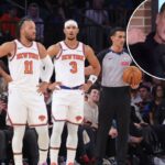 O técnico do St. John's Red Storm, Rick Pitino, na linha de base.