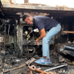 Palestinos usam veículo israelense abandonado para ajudar a fornecer água em Gaza