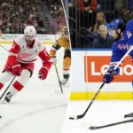 O pivô do Detroit Red Wings, Dylan Larkin (71), patina com o disco contra o pivô do Vegas Golden Knights, Brett Howden (21), durante um jogo de hóquei.