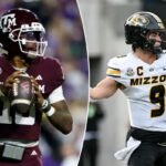 O quarterback do Texas A&M, Marcel Reed # 10, parece passar.