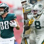 O tight end do Philadelphia Eagles, Dallas Goedert (88), comemorando com o quarterback Jalen Hurts (1) após marcar um touchdown.