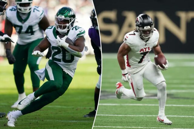 O running back do Atlanta Falcons, Bijan Robinson (7), carrega a bola.