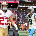 O quarterback do Carolina Panthers, Bryce Young, reagindo a um touchdown contra o Atlanta Falcons.