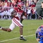 O running back do Arkansas, Mike Washington Jr. (4), corre para um touchdown contra o estado do Mississippi.