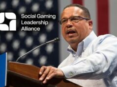 SGLA critica a repressão da Minnesota AG aos cassinos de sorteios como uma ação equivocada SGLA critica a repressão da Minnesota AG aos cassinos de sorteios como uma ação equivocada. O procurador-geral de Minnesota, Keith Ellison, em um pódio com a bandeira dos EUA ao fundo, com o logotipo da Social Gaming Leadership Alliance ao lado.