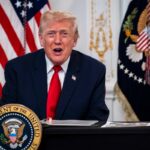 President Trump participates in a call with U.S. service members from Mar-a-Lago on Thanksgiving, 2025.(Photo by Pete Marovich/Getty Images)