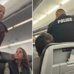 Um policial em um voo A321NEO da American Airlines.