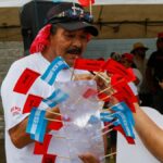 Apoiadores do candidato hondurenho Salvador Nasralla comemoram em evento político