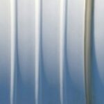 A Apple compartilhou lições do 'bendgate' ao ajudar pequenos fabricantes dos EUA a inovar | Imagem abstrata de linhas dobradas