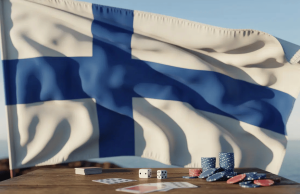 A Lei Finlandesa de Jogos de Azar é aprovada e o mercado de jogos de azar será aberto à concorrência Uma fotografia da bandeira finlandesa com sua distinta cruz nórdica azul sobre fundo branco. Finlândia aprova lei de jogos de azar e abre mercado licenciado
